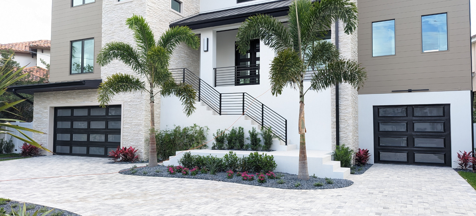 Full View Aluminum Glass Garage Doors on a home in Tampa