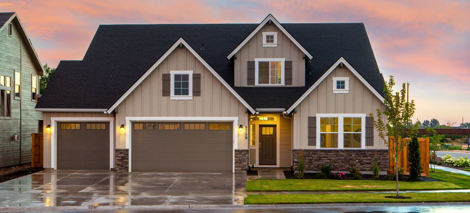 Beautiful home with two traditional garage doors