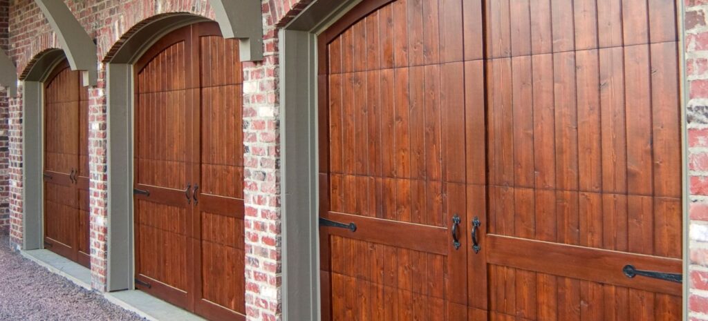 Custom Options: Three wooden garage doors with an arch