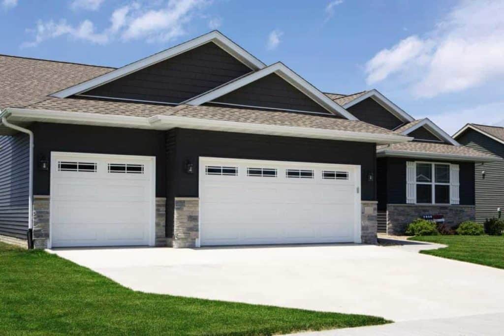 Traditional white steel residential garage door