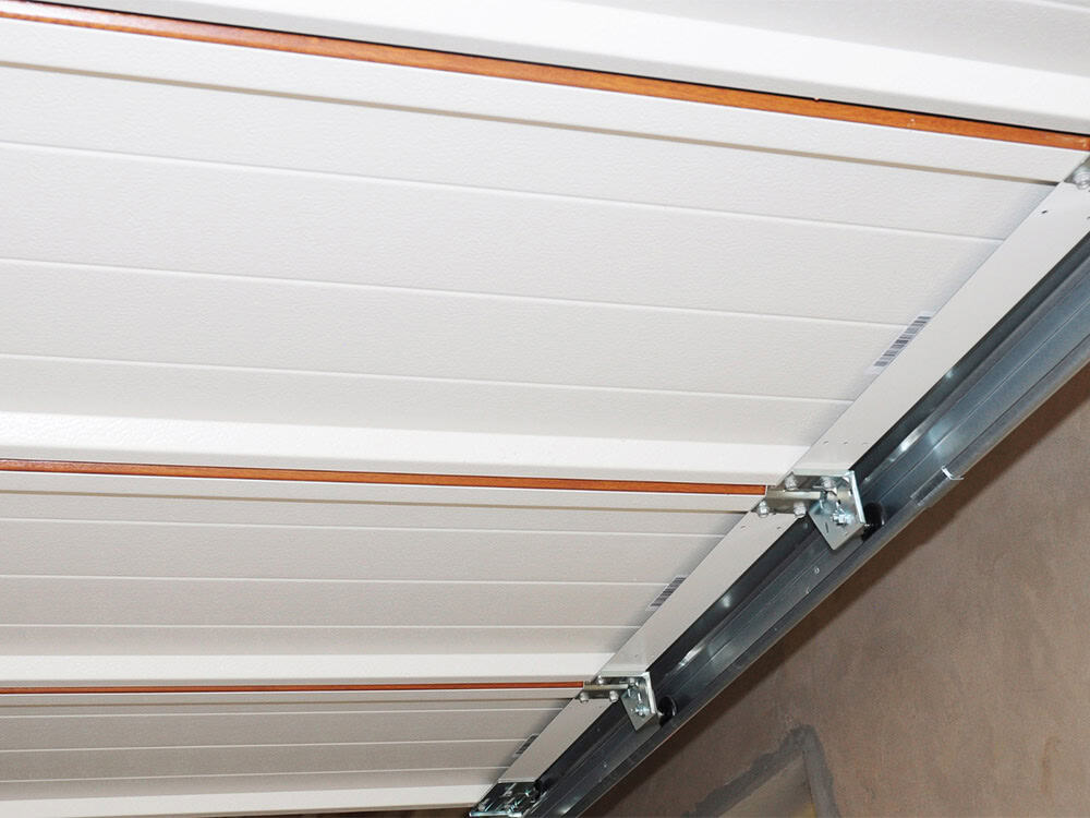Garage door track repair service