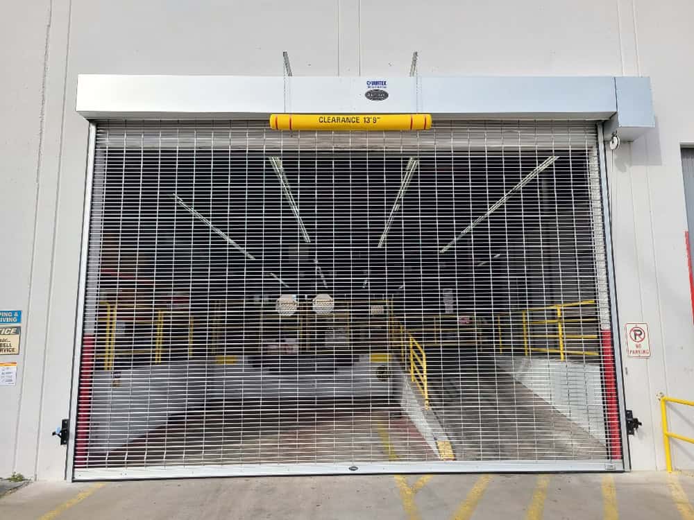 Rolling security grille for storefronts or warehouses